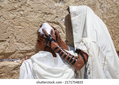 A Jewish Boy And His Father Pray At The Western Wall. Bar Mitzvah At The Western Wall