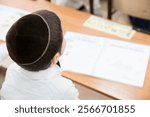 Jewish boyy with kippah  in the classroom,  Jewish School, Israeli Kids, Israel 
