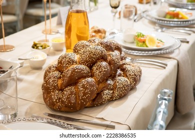 Jewish bread-challah for shabbat, wedding event. Orthodox Hasidic tradition food.