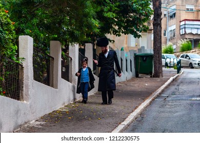 A Jewish Family Walks On The Sabbath,Haifa.Israel.  1 October 2018