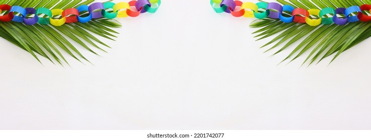 Jewish festival of Sukkot. Traditional succah (hut) colorful decorations - Shutterstock ID 2201742077