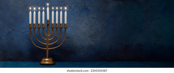 Jewish Hanukkah Menorah 9 Branch Candlestick. Holiday Candle Holder. Nine-arm candlestick. Traditional Hebrew Festival of Lights candelabra. Background for design with copy space.