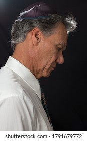 Jewish Man Rabbi, Praying While Wearing His Yamaka