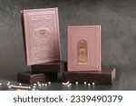 jewish Prayer books. On one book it is written: "Open the gates of heaven to our prayers". On the second book is written: "The Food Blessing"