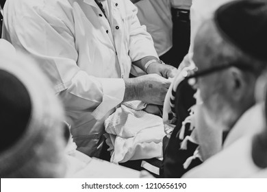 JEWISH Rabbi IN CIRCUMCISION CEREMONY