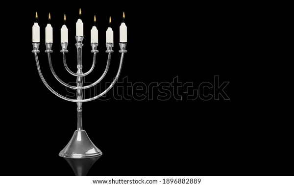 Jewish traditional lights holiday\
symbol Judaism Hanukkah menorah with are burning oil\
candles