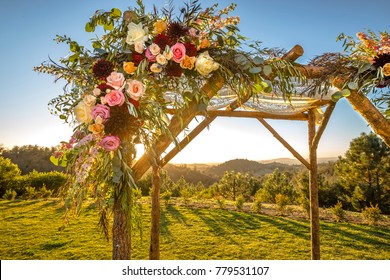 Jewish traditions wedding ceremony. Wedding canopy chuppah or huppah decorated with flowers