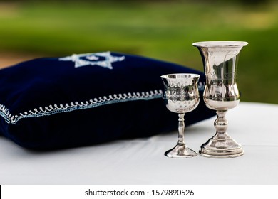 Jewish wedding kiddush cup and pillow