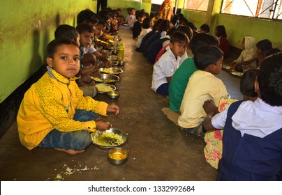 Jhargram, West Bengal, India- January 30, 2019: Mid Day Meal Program, An Indian Government Initiative, Is Being Running In A Primary School. Pupils Are Taking Their Meal.