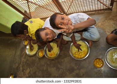 Jhargram, West Bengal, India- January 30, 2019: Mid Day Meal Program, An Indian Government Initiative, Is Being Running In A Primary School. Pupils Are Taking Their Meal.