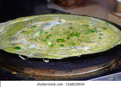 Jianbing Is A Traditional Chinese Street Food Similar To Crepes. It Is A Type Of Bing Generally Eaten For Breakfast Or Snack.