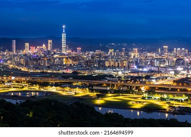 Jiantan Mountain,Taipei City,Taiwan,June 4, 2022:The Night View Of Taipei City Shot With Slow Shutter From The Top Of The Mountain