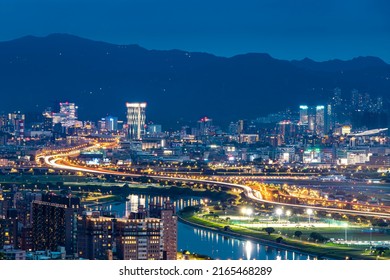 Jiantan Mountain,Taipei City,Taiwan,June 4, 2022:The Night View Of Taipei City Shot With Slow Shutter From The Top Of The Mountain