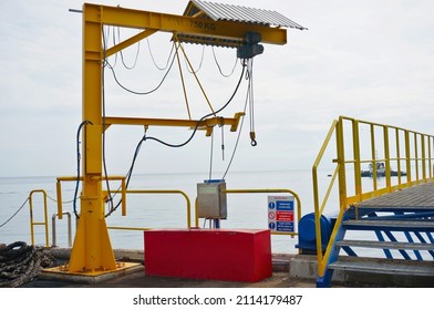 A Jib Crane On A Jetty