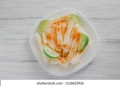 jicama con chile, mexican snack, fruit, turnip, food in mexico jicamas lemon vegetable