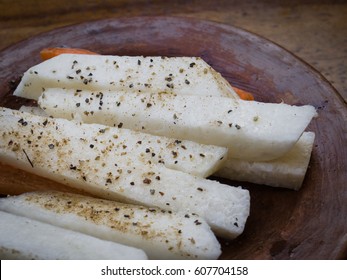 Jicama slices seasoned with  spices at a restaurant in Oaxaca City Mexico