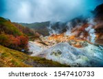 Jigokudani or Hell Valley ,Noboribetsu Onsen, hot steam vents, sulfurous streams and other volcanic activity, hot spring waters, Hokkaido, Japan, traveling concept.