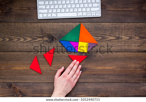 jigsaw puzzle game piece\
office table in business strategy set wooden background top view\
mock up