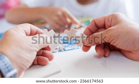 jigsaw puzzle in hand Ideas for expressing opinions in family business Seeing things differently but getting along with each other.