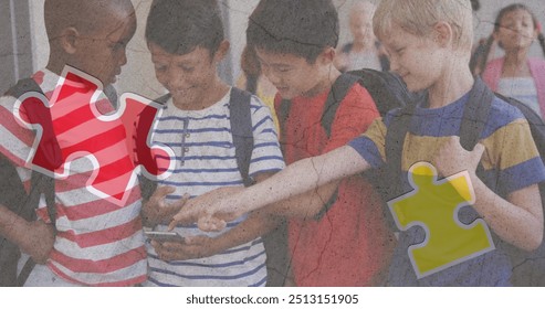 Jigsaw puzzle and human head icon against diverse group of boys using smartphone at school. Autism and school education concept - Powered by Shutterstock