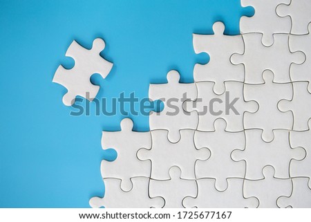 Jigsaw puzzle with missing piece. Completing final task, missing jigsaw puzzle pieces and business concept with a puzzle piece missing.