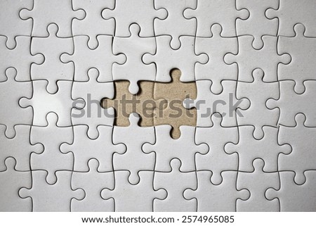 Jigsaw Puzzle with Missing Piece and Connected Pieces