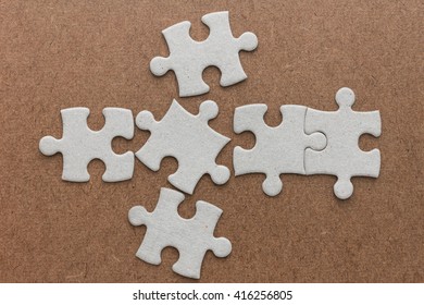 Jigsaw Puzzle On Brown Wooden Stock Photo 416256805 | Shutterstock