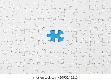 Jigsaw puzzle with one piece missing - Powered by Shutterstock