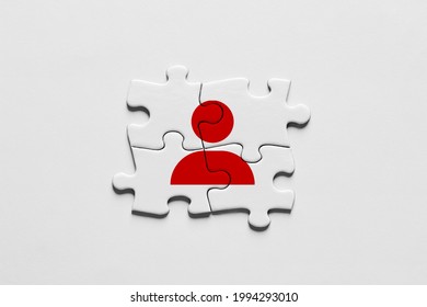 Jigsaw Puzzle Pieces Connect To Each Other And Form An Employee Or User Icon. User Interaction, Communication Network Or Team Building And Teamwork Concepts. 