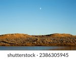 Jim Bridger Recreational Area at Sunset with Moon in the Sky