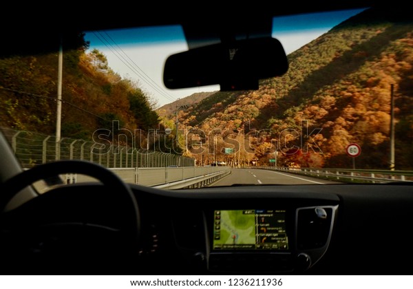 Jirisan National Park, South Korea circa 10\
November 2018. A view from the car heading back from Jirisan\
National Park in\
autumn.