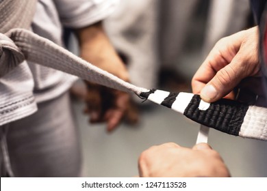 Jiu Jitsu Professor Grading A Student