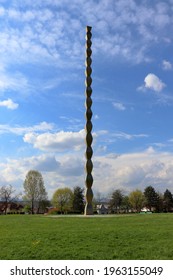 Târgu Jiu, RO - April 25, 2021: Endless Column (Coloana Infinitului) from the Sculptural Ensemble of Constantin Brâncuși. Homage to Romanian soldiers of WW1. Artistic viewpoint of west side in spring.