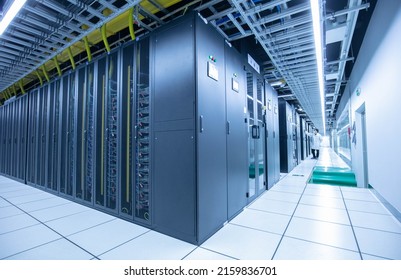 Jiujiang, China - May 21, 2022: An IDC inspection engineer checks the server operation in the machine room of China Telecom's Central Cloud Computing Big Data Center.Cooperate with alibaba, JD, Inspur