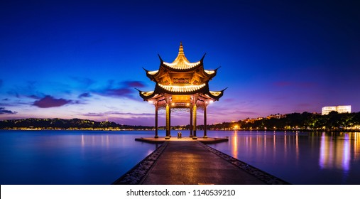 Jixian pavilion in hangzhou during sunset.the chinese word in photo means"Jixian pavilion".chinese ancient pavilion on the west lake in hangzhou.West Lake of the most famous scenic spots in China.