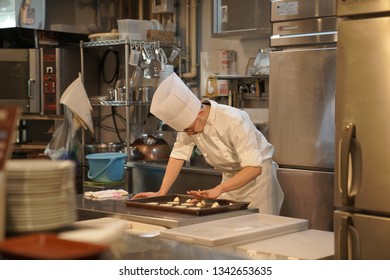 Jiyugaoka, JAPAN - JAN 22, 2019: A Pastry Chef Is Preparing To Bake Dessert