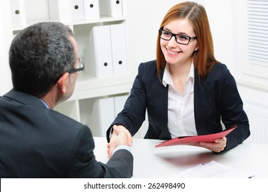 Job Applicant Having Interview. Handshake While Job Interviewing