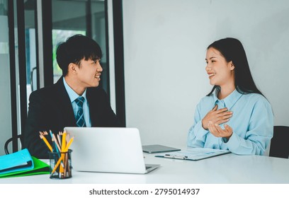 Job applicant introducing himself For a job interview after submitting a resume document to the Human Resources Manager for consideration for employment in the company.