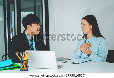 Job applicant introducing himself For a job interview after submitting a resume document to the Human Resources Manager for consideration for employment in the company.