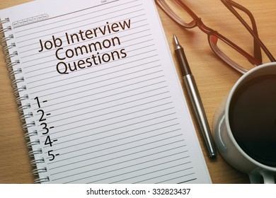 Job Interview Common Questions Written On Notebook - Business Conceptual