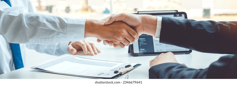 Job interview concept , Senior manager reading a resume during a job interview employee young man meeting Applicant and recruitment - Powered by Shutterstock