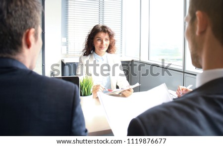 Job interview with the employer, businessman listen to candidate answers.