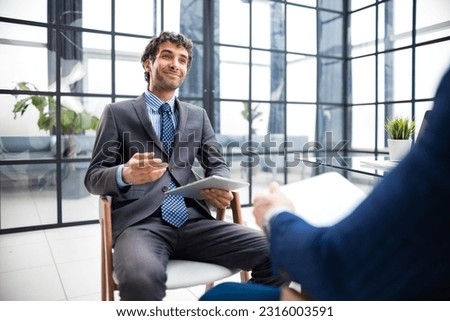 Job interview with the employer, businessman listen to candidate answers