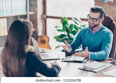 Job Interview - Joyful, Successful Businessman Asking Candidate Questions, Sitting At Desk In Workplace On Chair, Girl Making Notes