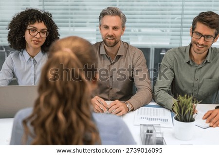 Job interview process is in office. Human resources, meeting and group of hiring candidates for vacancy.