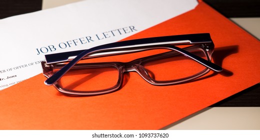 Job Offer Letter, Envelope And Glasses. Red Letter On The Day Of Successful Job Search.