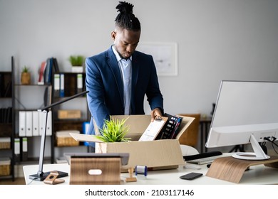 Job Quit. Employee Holding Cardboard Box At Desk