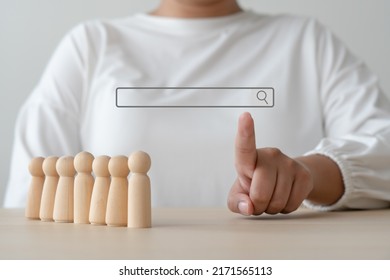 Job Search Concept In Wooden Person Standing On Table. Search Browser Bar With Magnifying Glass Searching For Available Hiring Position.