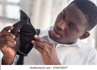 Jobless African Black Man Have No Money; Concept Of No Money, Economic Recession, Great Depression, Joblessness, Unemployment, Unemployed People, Layoff, Financial Problem, Financial Crisis, Job Cut 