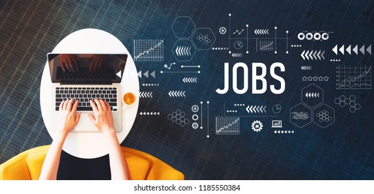 Jobs With Person Using A Laptop On A White Table